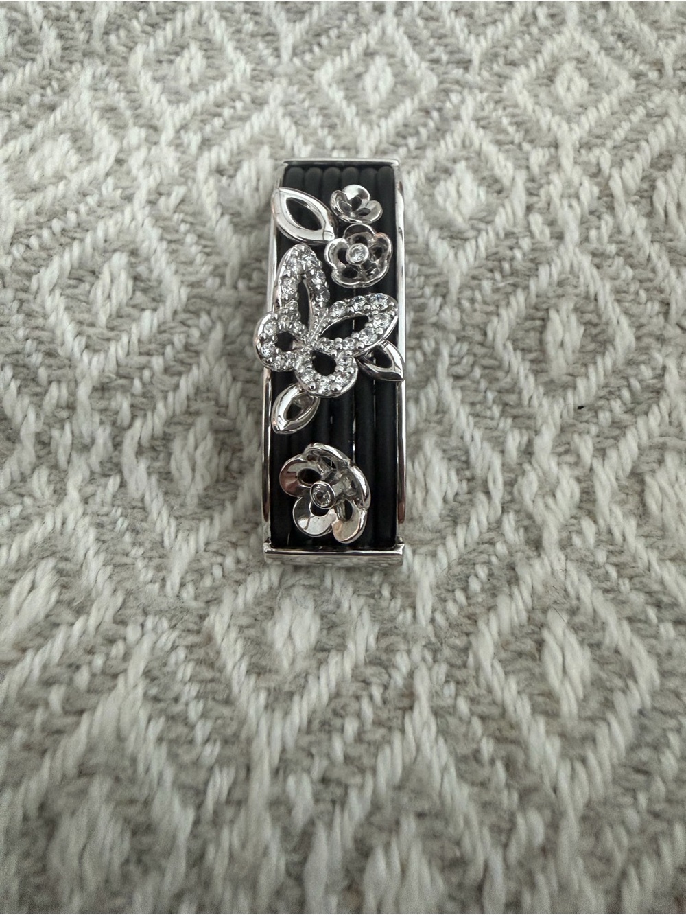 Belle Etoile Sterling Silver Butterfly and Floral Black Italian Rubber Pendant